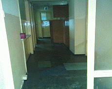 Corridoio dell'associazione milanese prima del restauro